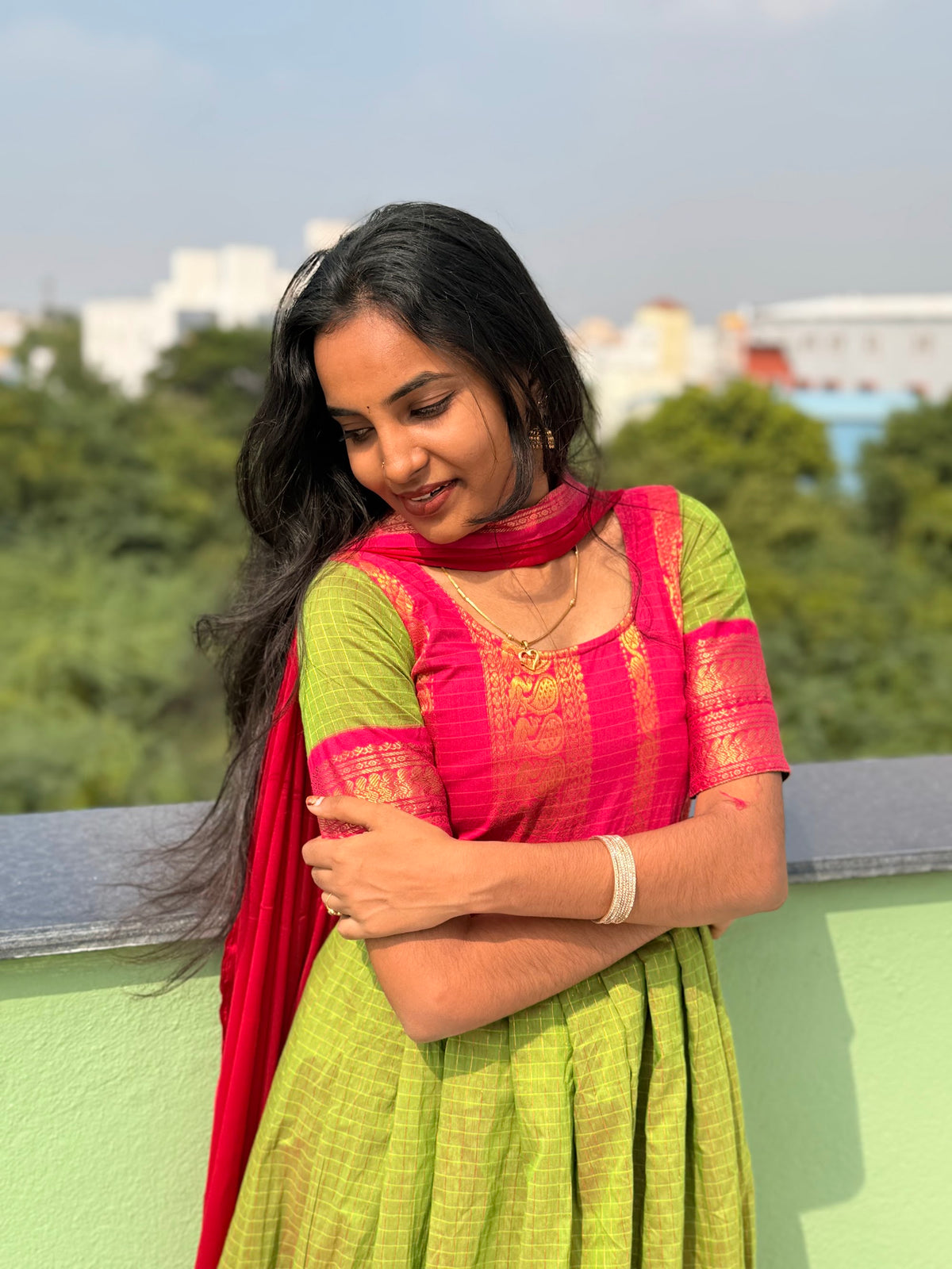 Green Anarkali with pink Georgette dupatta flared view