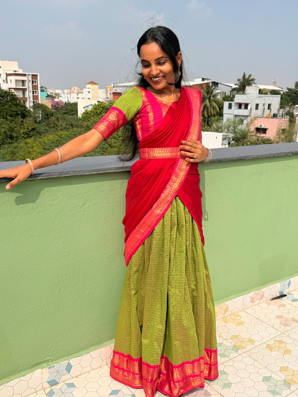 Green Anarkali set with matching pink dupatta and belt